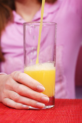 woman with glass of juice