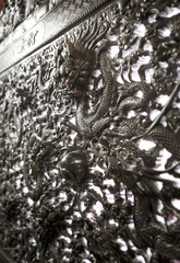 Closeup of Chinese carved dragon wood grain