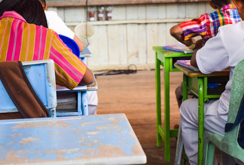 happy children group in school classroom