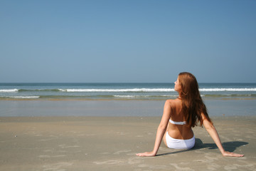 Fototapeta na wymiar Woman on the beach