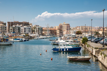 Fototapeta na wymiar Harbor of Syracusa at Sicily, Italy