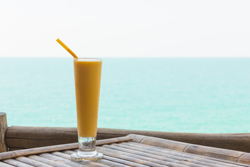 Enjoy a mango shake with great views on the beach