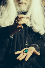 Pendulum in hands of wizard