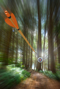 Arrow speeding to archery target with motion blur, part photo, part 3D rendering