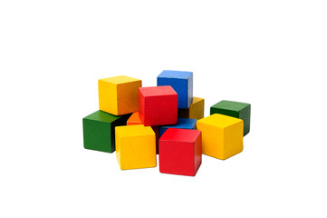 Wooden colorful building blocks isolated on white background. Cubes constructor. Vintage childrens toys.