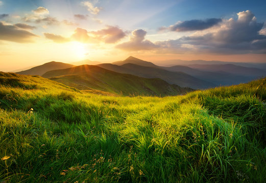 Fototapeta Mountain valley during sunrise. Natural summer landscape.