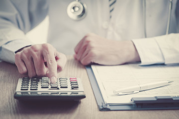 closeup of a young caucasian healthcare professional wearing a w