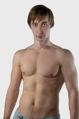 Fototapeta premium Молодой человек с голым торсом