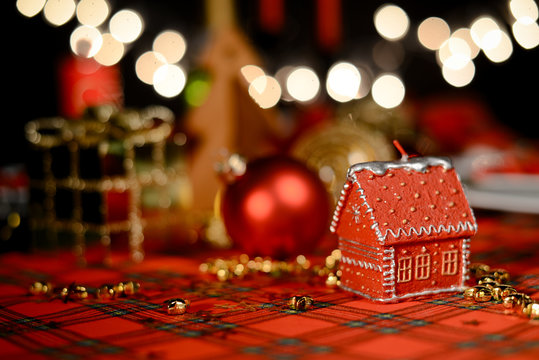 gold and red christmas table decoration with dim light candle Stock Photo | Adobe Stock gold and red christmas table decoration with dim light candle Stock Photo | Adobe Stock