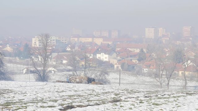 Fog over town of Zajecar filmed from park hill Kraljevica 4K 3840X2160 UHD footage - Eastern Serbian town of Zajecar on early morning 4K 2160p UHD video 
