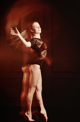 young beautiful dancer girl dancing and jumping, studio