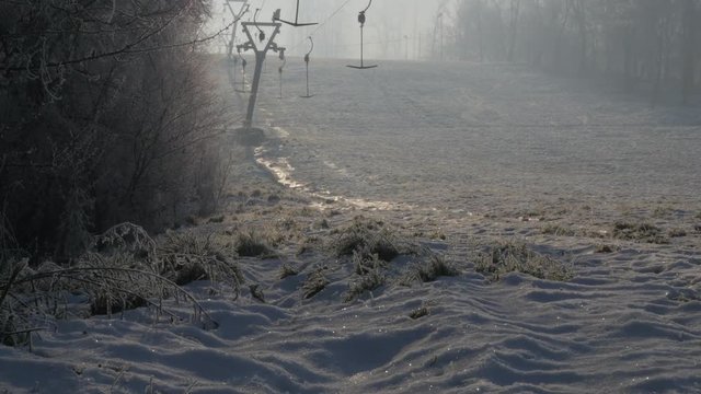 Fog on Kraljevica hill ski slopes 4K 2160p UHD footage - Ski slopes near Eastern Serbian town of Zajecar under snow 4K 3840X2160 UHD video 