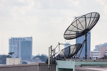 Satellite damaged and antenna on the old building.