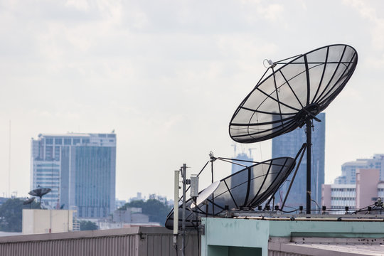 Satellite damaged and antenna on the old building.