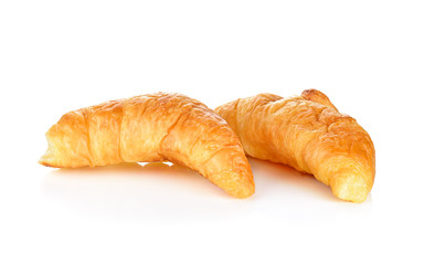 Fresh and tasty croissant over white background
