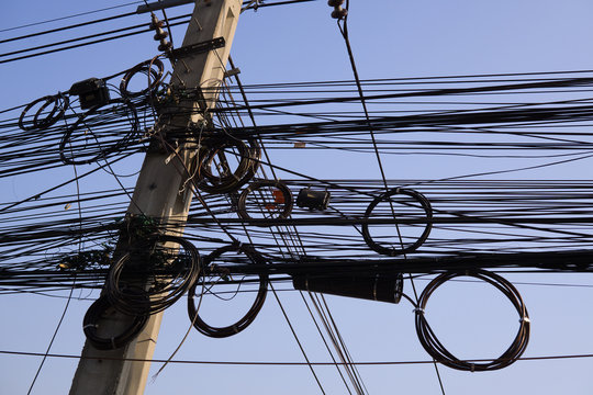 The power cord is coiled neatly on poles