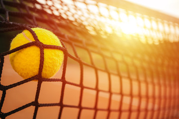 Tennis ball in net
