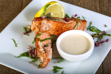 Baked salmon with sauce