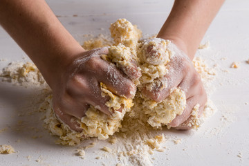 making dough by female hands