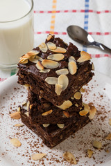stack of brownies on white plate