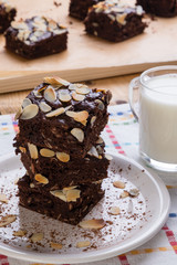 stack of brownies on white plate