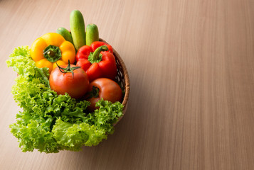 Fresh vegetable prepared in bowl on wooden table, Lettuce cucumb