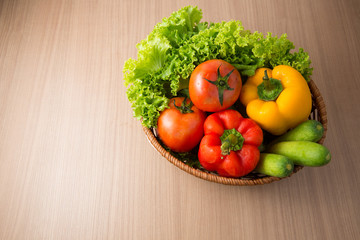 Fresh vegetable prepared in bowl on wooden table, Lettuce cucumb