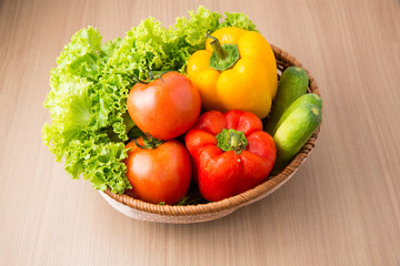 Fresh vegetable prepared in bowl on wooden table, Lettuce cucumb