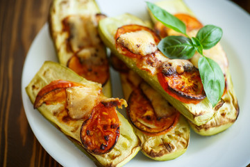 zucchini baked with tomatoes and cheese