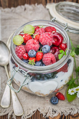 Fresh muesli with yogurt and berry fruits