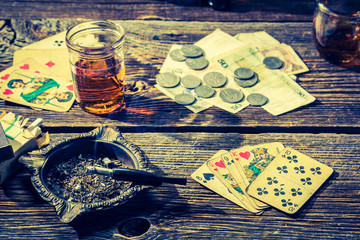 Vintage table for illegal poker with cards and money