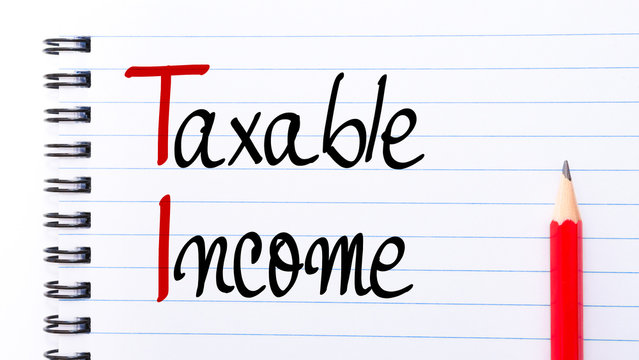 TI Taxable Income Written On Notebook Page