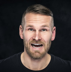 Obraz premium Handsome man looking at camera.