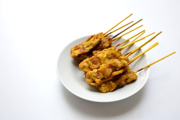 Satay pork in dish