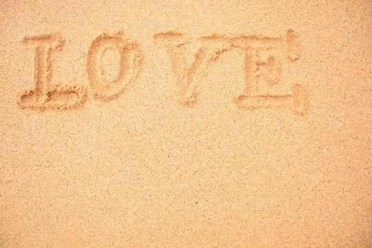 Love You in den sand geschrieben 