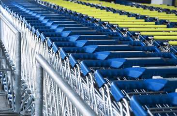Collected in the number of shopping carts around a supermarket, blue and yellow