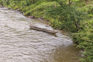 Wooden Boat at Riverfron in Ecuadorian Amazonia