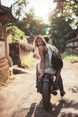 Young couple riding motorcycle © Jacob Lund