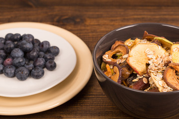 good breakfast, Organic Breakfast Quinoa with Nuts Milk and Berries, Breakfast oatmeal porridge with cinnamon, cranberries and blueberries, , selective focus, close up, front view