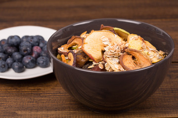 good breakfast, Organic Breakfast Quinoa with Nuts Milk and Berries, Breakfast oatmeal porridge with cinnamon, cranberries and blueberries, , selective focus, close up, front view