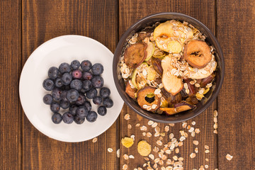 good breakfast, Organic Breakfast Quinoa with Nuts Milk and Berries, Breakfast oatmeal porridge with cinnamon, cranberries and blueberries, , selective focus, close up, front view