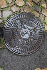 An old sewer manhole cover