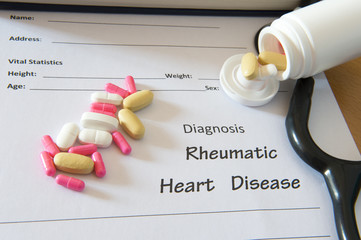 Patient diagnosis  form with pills and stethoscope. Medical conc