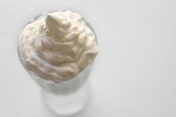 Delicious milkshake on wooden table