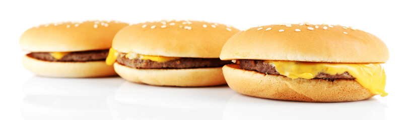 Tasty cheeseburgers, isolated on white