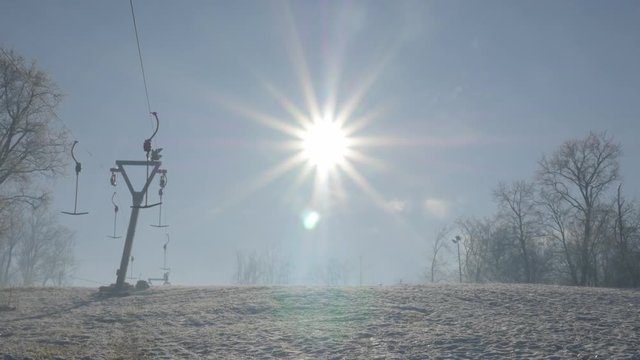 Modern ski complex and ropeway above town of Zajecar in Eastern Serbia 4K 3840X2160 UHD video - Winter time on the snowed ski slopes at early morning 4K 2160p UHD footage 