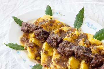 Polenta with wild boar stew