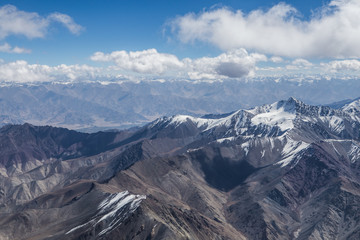 Himalaya mountains under clouds