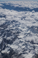 Himalaya mountains under clouds