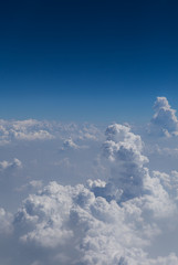 clouds and blue sky seen from plane